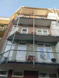 Balkonreparatie Betonreparatie schilderwerk en triflex profloor ststeem VvE Haarlemmermeerstraat Amsterdam 7
